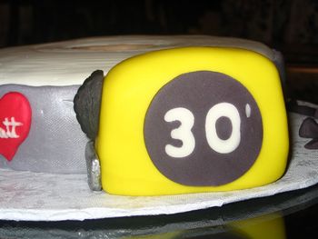 Closeup of tape measure that goes with duct tape cake. I'm in the beginning stages of a remodel and reached for this thing at least a half-dozen times to measure something!