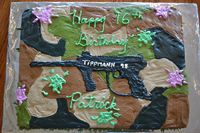 I did this cake for my son's 16th birthday.  He loves paintball, so that is the theme I went with.  Cake is done in buttercream.  I had a hard time getting it smooth, as you can see!  If I'd have had more time, I'm sure it would have looked better!!!  He loved it!  So, that is all that matters.