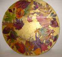 This Autumn's leaves were spectacular! I made the cake board from those collected from my yard and dried in a microwave flower press. I covered a foam core board with metallic gold tissue paper and fixed the leaves down with spray adhesive and food safe Press 'n' Seal. There are no artificial colors used. I hated to cover them up with the cake! Oh well. I matched the colors of the gum paste leaves to the actual leaves. No one would believe the colors if I didn't have the side by side comparison.