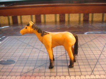 The buckskin mustang for 5 yr old's cowgirl cake. Made of fondant over wire armature.