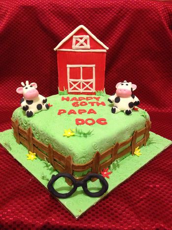 My customer was a retired Eye doctor and currenty was a Cow Farmer.  Cake is Lemon Chiffon with Lemon Curd filling covered in Fondant. Barn is Fondant/Tylose Powder combination, Cows and fence pure fondant. If you look Close the cows are wearing glasses!  =-)