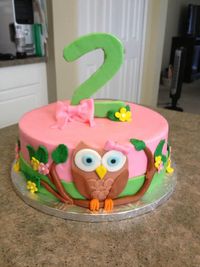 * Owl Cake in buttercream with fondant decorations.