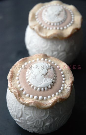 I made these for fun. I love Cameo's and pearl dust. and I got to play with my curly cookie, (how to on cakecentral.com) :) Thx for watching!