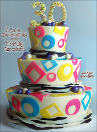80's themed birthday cake finished in buttercream and modeling chocolate. Instructions for how to make the modeling chocolate decorations >> http://www.wickedgoodies.net/cake-decorating-with-modeling-chocolate/
