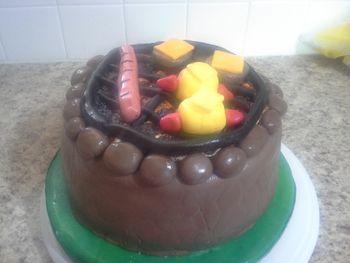 * Based this cake on multiple cakes I saw here. Coals are toasted marshmallows.