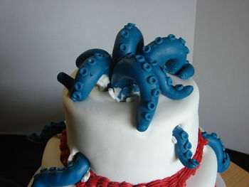 This is my Cthulhu cake.  The cake is covered in MMF. The tentacles are MMF with Tylose powder added.