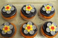 homemade modeling chocolate flowers.  colors are not deeply saturated enough, will do better next time.