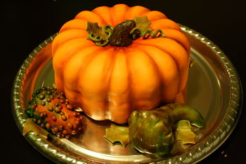 Fall themed cake that I'm donating to a silent auction...everything is made out of cake :) First time airbrushing too.