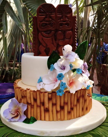 Luau themed cake with all MMF decorations - including bamboo, flowers & tiki