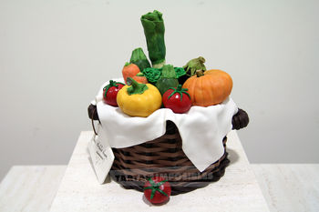 Brownie and hazelnut cream. Basket made with fondant and modelling chocolate. All vegetables made with RKT and white modelling chocolate.