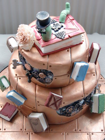Steampunk book work cake. This was my most favorite cake to make so far. For a special girl who just loved to read and was very into steampunk and old fashioned things. Complete with a steampunk book topper with a vintage book worm.