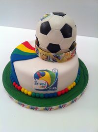 Cake on a cake made for work raffle for opening day of World Cup Brazil 2014 Football tournament.