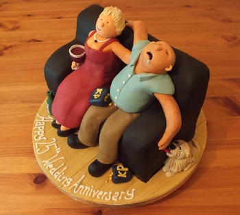 This was a great fun little 8x4 inch sofa cake. Since the figures would make up such a big part of a slice I used 100% modelling choc so that they tasted good :) The story is that Dad falls asleep eating his peanuts and the dog waits by the chair to lick the salt off his fingers when his arm flops down!