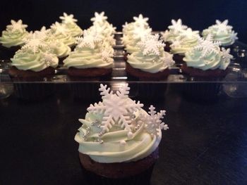 Snowflake Cupcakes . Snowflakes done with PME cutter.
